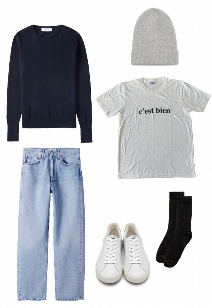 Graphic t-shirt, cashmere crew sweater, and jeans outfit