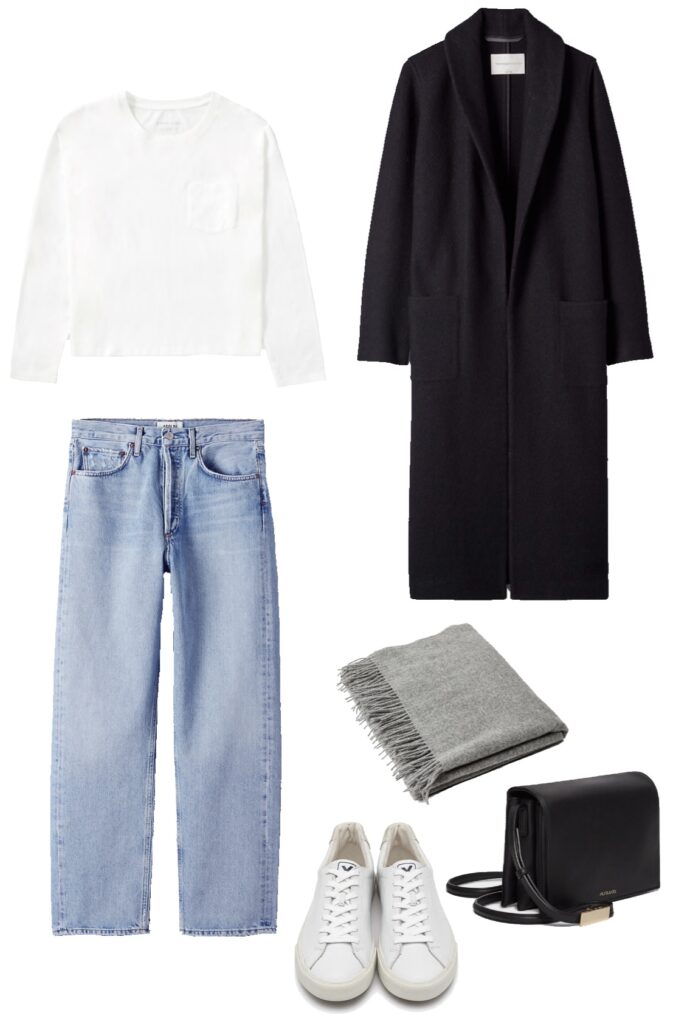 Outfit with white tee, jeans, black jacket, and sneakers